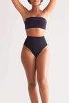 Model wearing UNDRESSE High-Waist Thong in Black Front Side